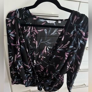 Three quarter sleeve wrap front blouse